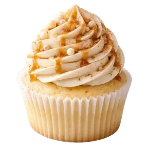 A vanilla cupcake with swirled white frosting, inspired by a White Russian, drizzled with caramel sauce and topped with small white sprinkles, in a white paper cupcake liner.